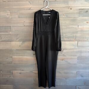EXPRESS | NWT Black V-Neck Jumpsuit Lace Detailing Size 10